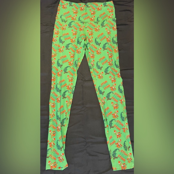 Spread the Holiday Cheer wearing a pair of The Grinch Leggings! - Picture 2 of 5